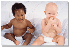 Photo of black and white infants.
